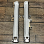 Стаканы вилки Sportster 08-13 Dyna 04 OEM